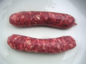 Saucisse de Toulouse crue, spécialité emblématique toulousaine